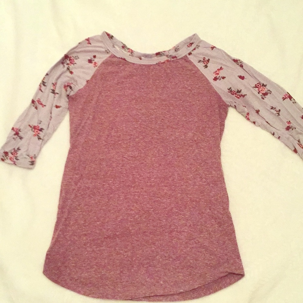 A plum and lavender shirt with mid-length sleeves